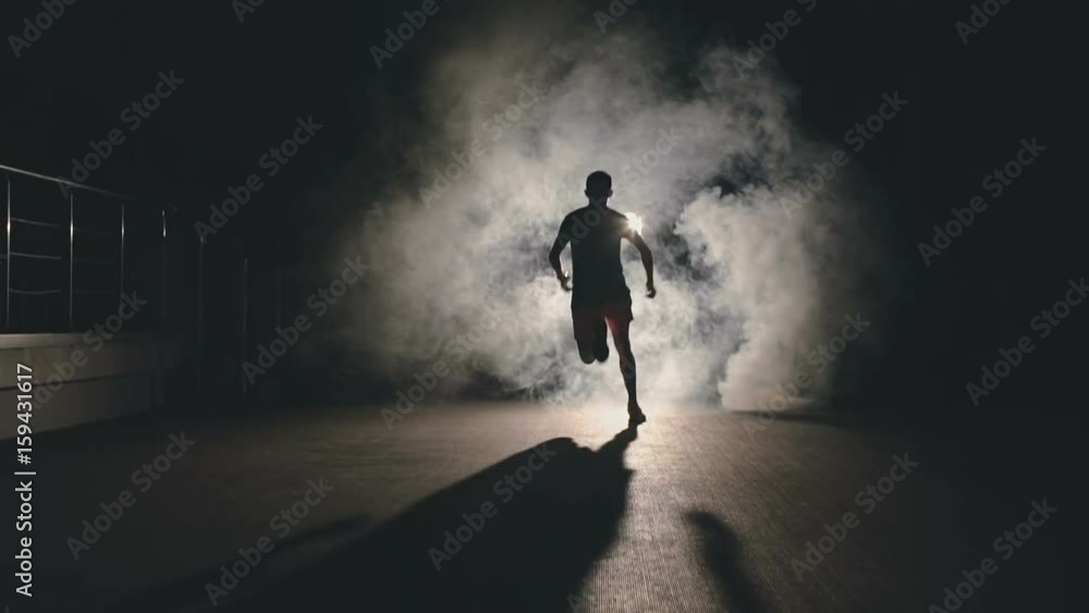 The athlete trains in the distance race, slowmotion The athlete trains in the distance race, slowmotion