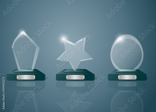 Sport competitions glass trophies prizes collection on transparent reflective surface realistic image with dark shadowy background vector illustration