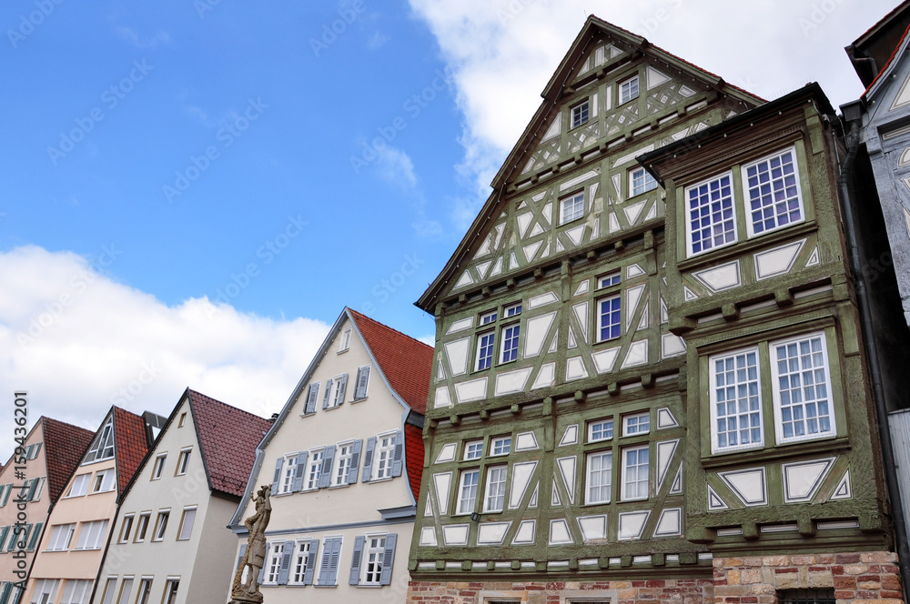 Look up at the old colored half-timbered houses in Boblingen, Baden-Wurttemberg, Germany.