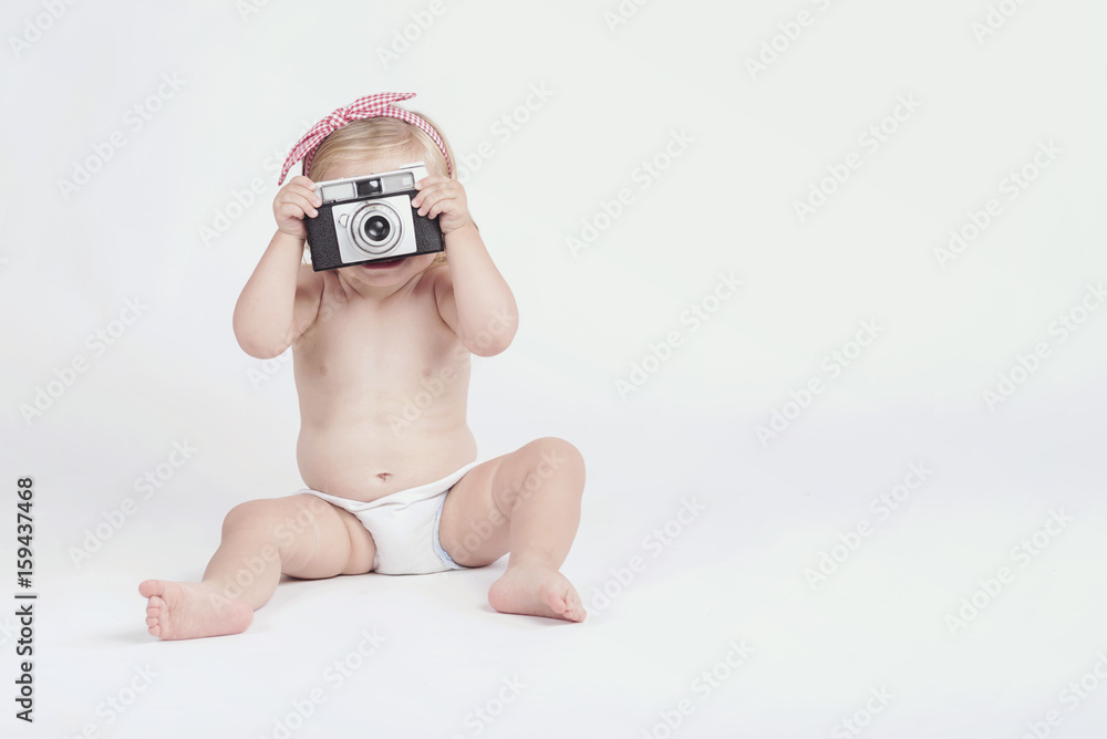bebé con cámara de fotos Stock Photo