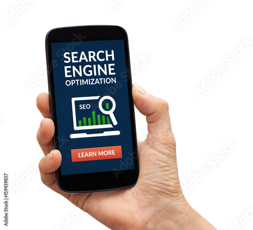 Hand holding a black smart phone with search engine optimization (SEO) concept on screen. Isolated on white background. All screen content is designed by me.