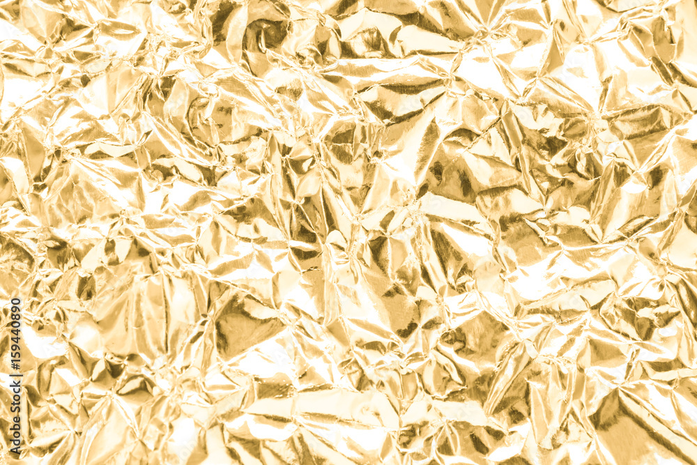 Gold wrinkled paper texture abstract background Gold wrinkled paper texture abstract background