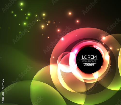 Glowing shiny overlapping circles composition on dark background