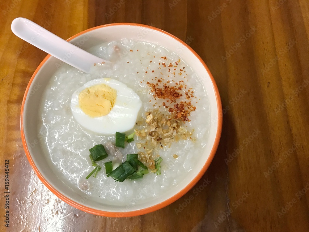 Rice Porridge in the bowl, soft boiled rice in pork soup. Rice Porridge in the bowl, soft boiled rice in pork soup.