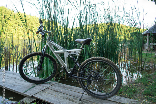 Bicycle sport on nature near the river. photo