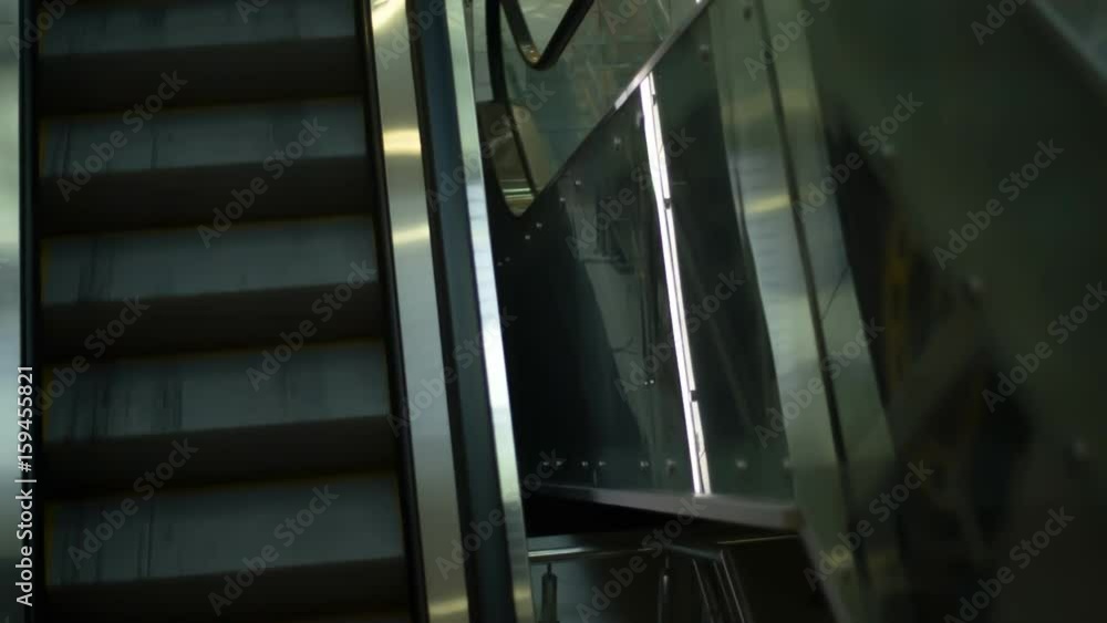 Escalator in the shopping center Escalator in the shopping center