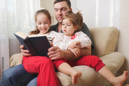 father with daughter at home