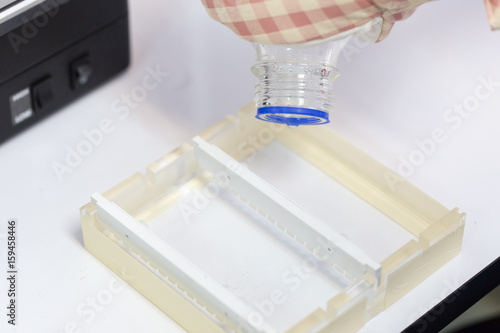 Equipment for analyze samples into the agarose gel and for the separation of DNA fragments in Laboratory. photo