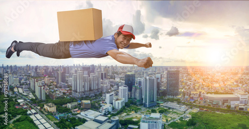 delivery man flying over city scape with container box on back, for logistic and shipping cargo service business photo