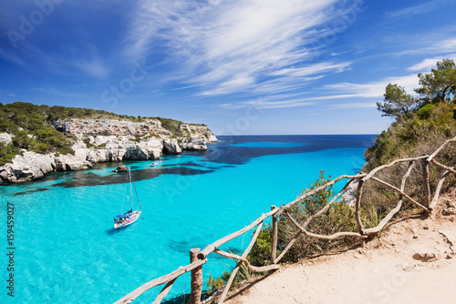 Fototapeta Naklejka Na Ścianę i Meble -  Beautiful bay with sailing boats, Menorca island, Spain