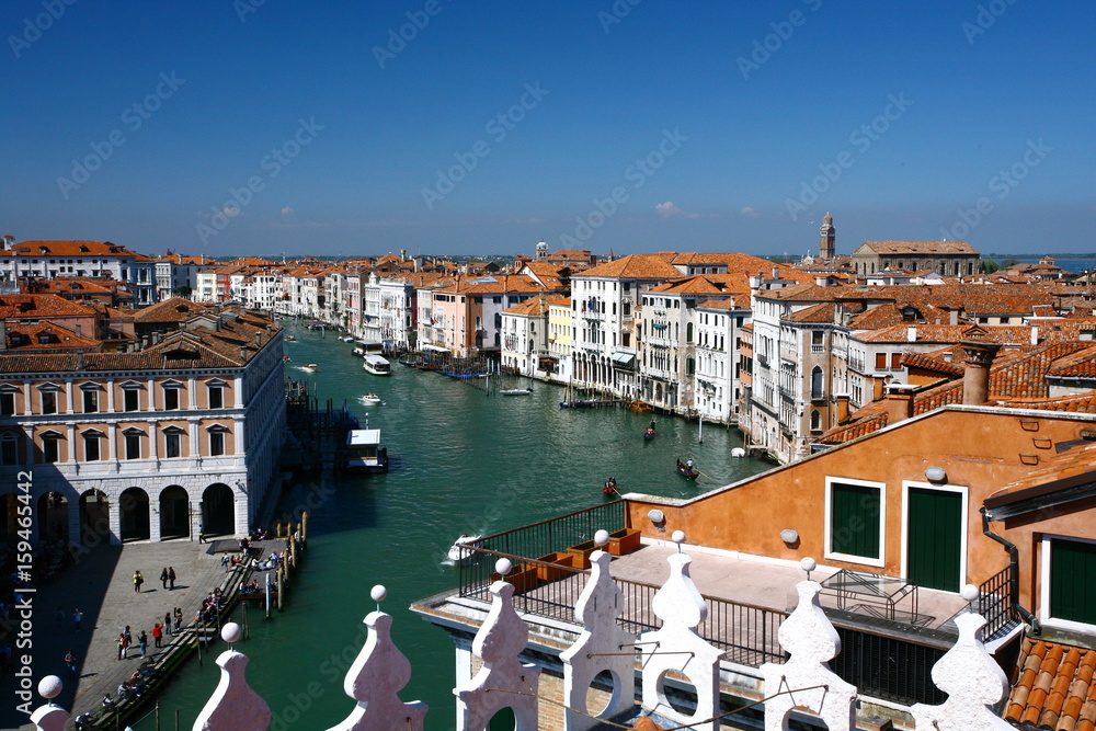 Venice is the capital of the Veneto region. It is situated across a group of 118 small islands. The city is separated by canals and linked by bridges.