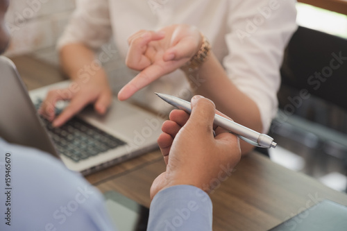 young business people and entrepreneur having a meeting around table in office. Conference, discussion, teamwork, collaboration, corporate concept.