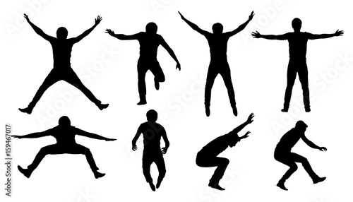 Set of black vector silhouettes of jumping or falling man isolated on white background