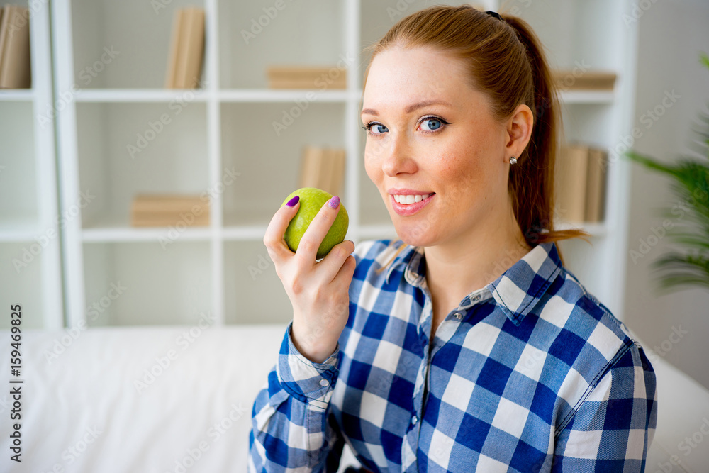 Pregnant woman eating fruit