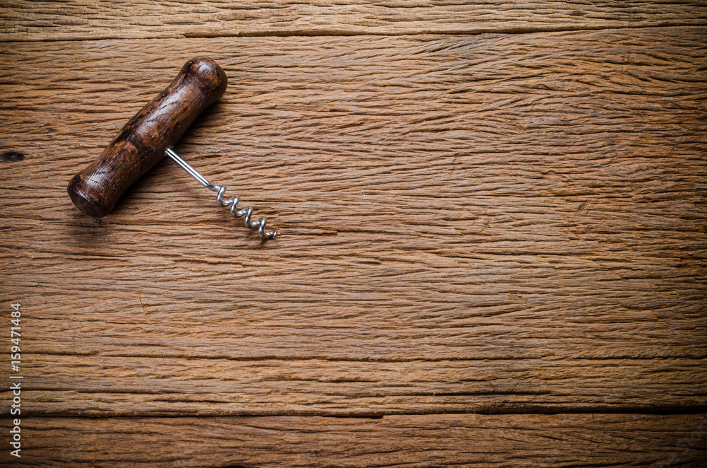 corkscrew on wooden background