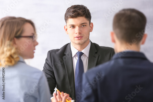 Human resources commission interviewing young man