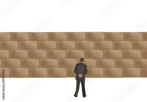 persona ferma che guarda un muro 