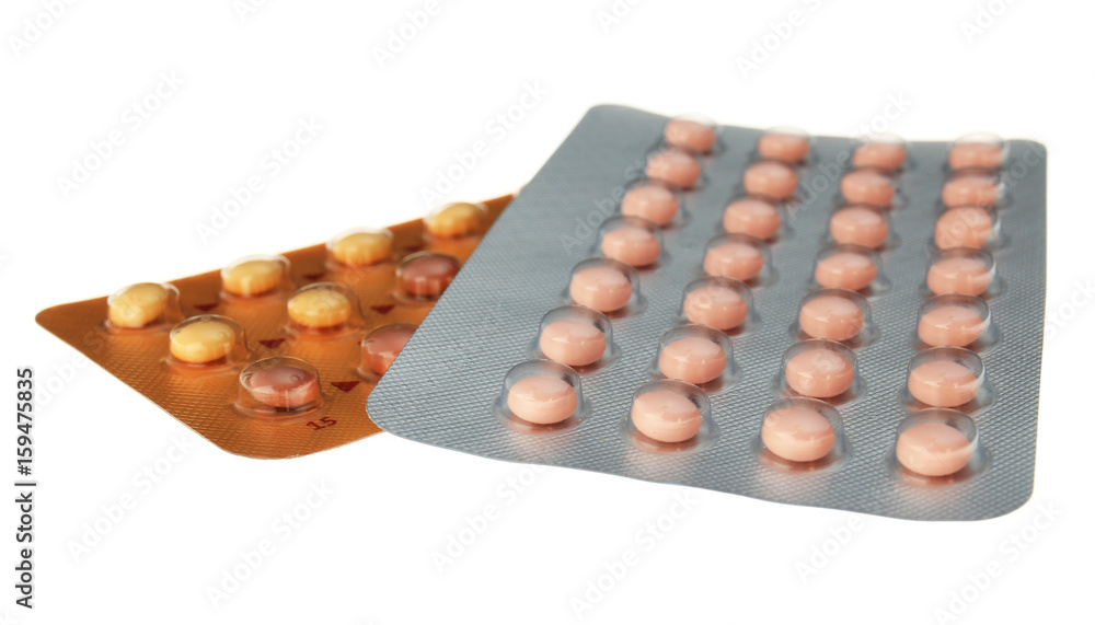 Oral contraception concept. Two packages of birth control pills on white background Oral contraception concept. Two packages of birth control pills on white background