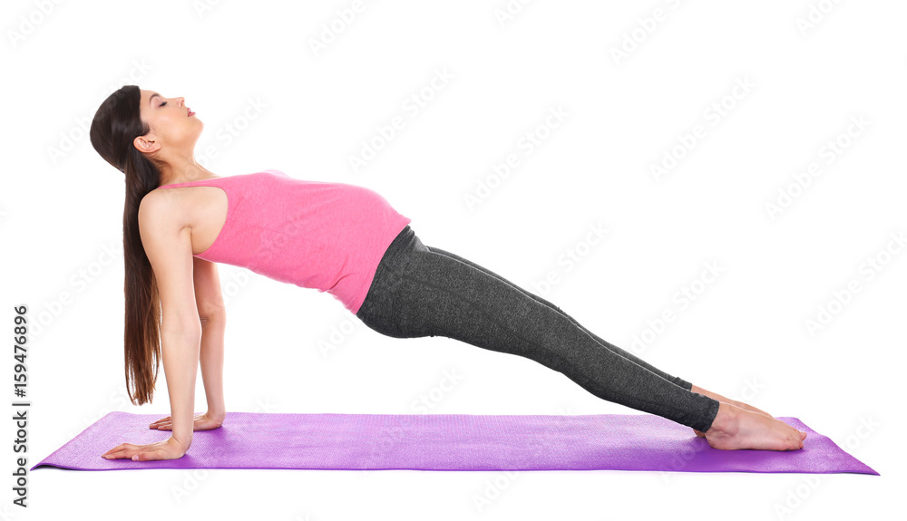 Young beautiful pregnant woman doing yoga exercise isolated on white Young beautiful pregnant woman doing yoga exercise isolated on white