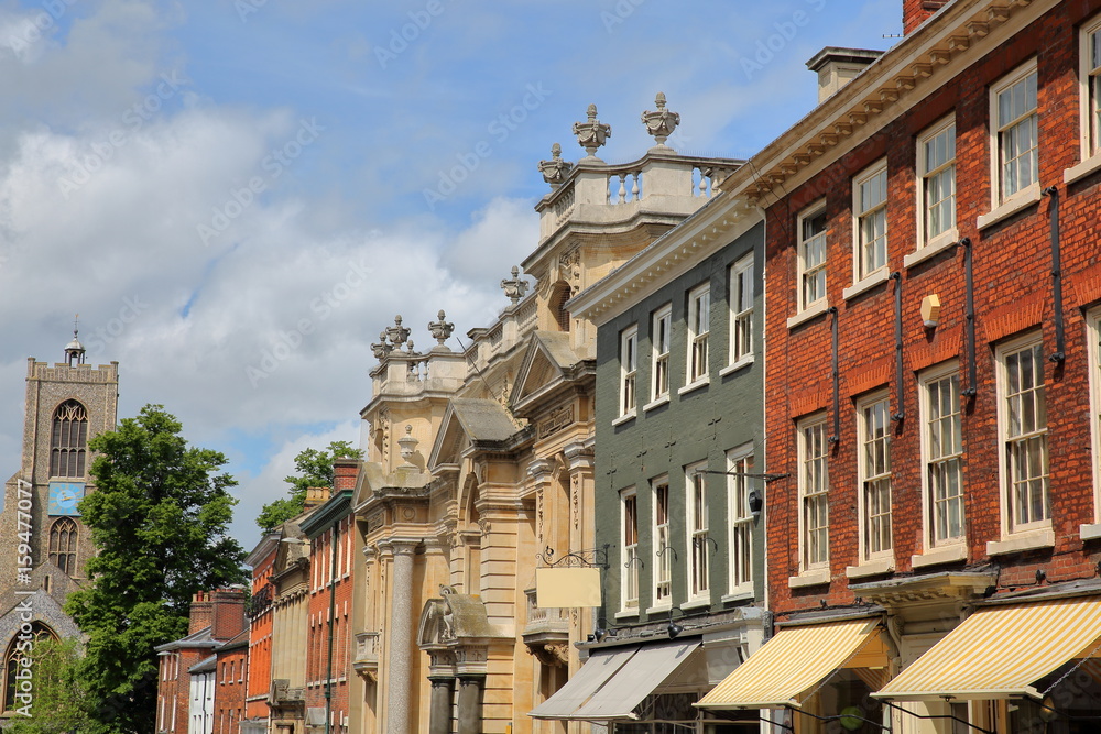 Fototapeta premium Georgian and Victorian houses at St Giles Street in Norwich, Norfolk, UK - The Church of St Giles in the background