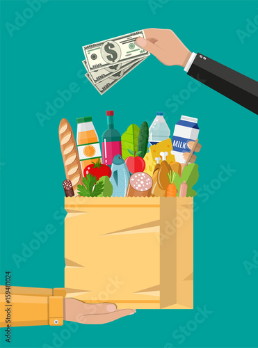 Paper shopping bag full of groceries products