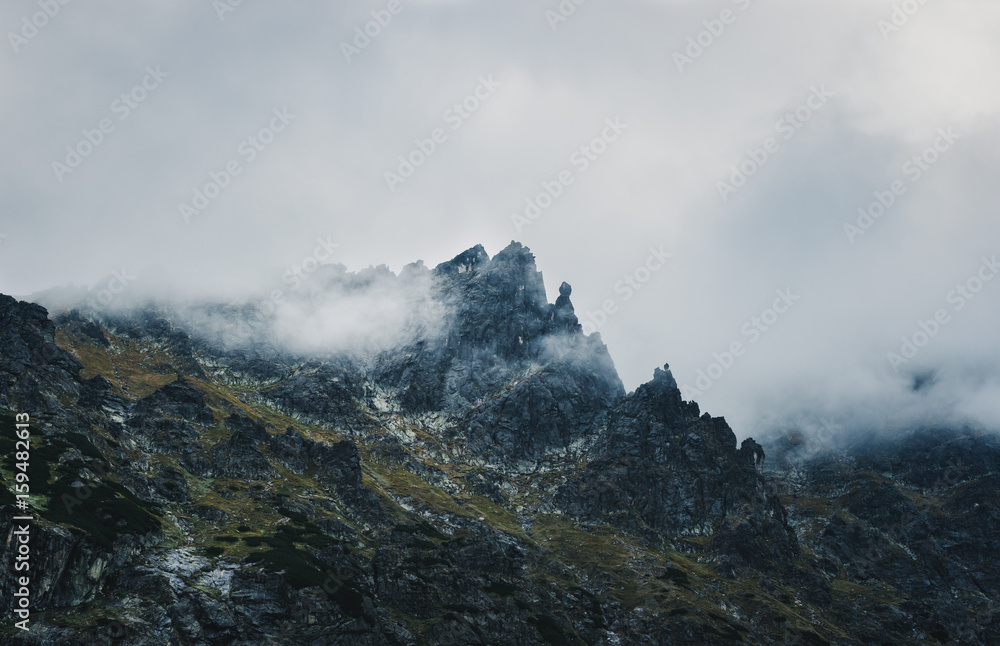 Mountain peak shrouded in storm clouds. Eastern Tatra Summits, Poland