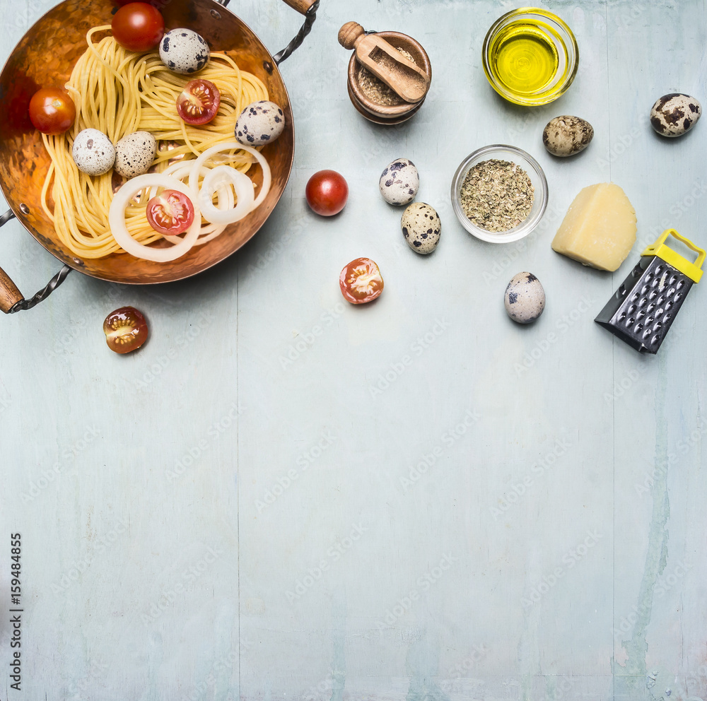 concept cooking homemade vegetarian pasta with cherry tomatoes, parmesan cheese, quail eggs and seasonings, pasta in a copper bowl with the other ingredients, Border, place for text