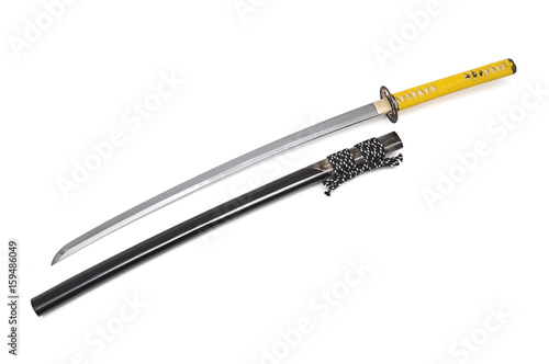 Japanese sword and scabbard on white background wrapped handle by yellow leather and ray skin on scabbard