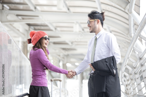 young asian woman traveller standing in city with friend, Travel concept. photo