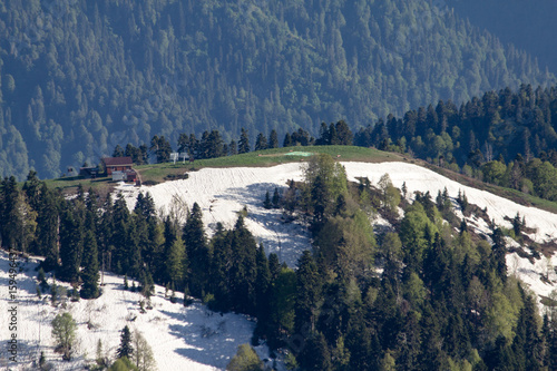 View of the houses at the foot of the mountains