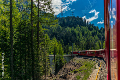 Quadro em tela Red train slowly climbing to the Bernina Pass in the Swiss Alps - 4