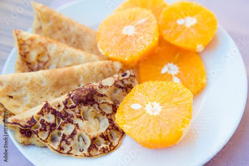 pancakes and oranges for Breakfast