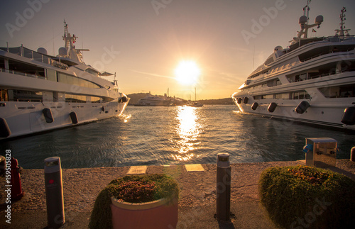 Obraz na plátně Luxury, rich Yachts moored in a harbor of Porto Cervo