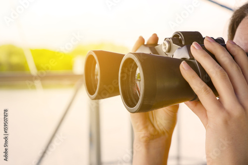 Girl Look Through Binoculars