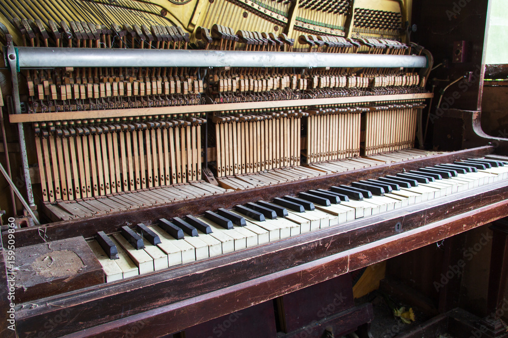 Keys from an old broken damaged piano Keys from an old broken damaged piano