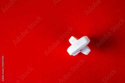 Pills ,tablets and stethoscope on white background
