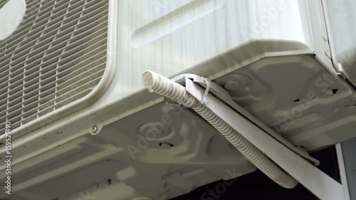 Water dripping from air conditioner.