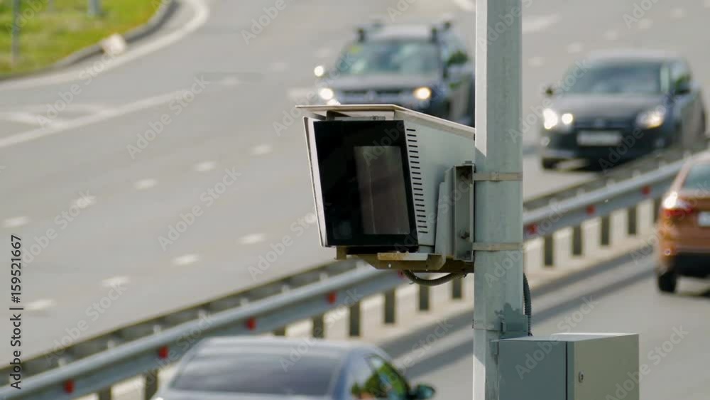 Radar speed control camera on the road. Close up Radar speed control camera on the road. Close up