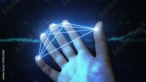 Abstract hologram of the connection of the fingers of the hand. Technological concept