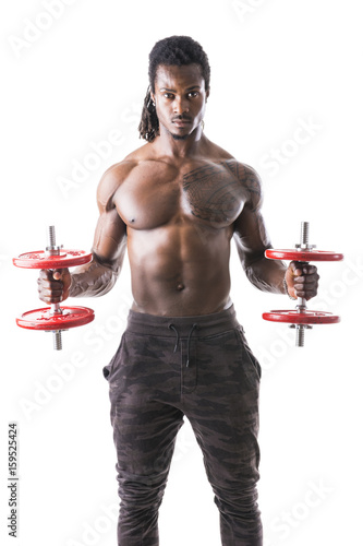 Muscular sexy shirtless young black man exercising biceps with dumbbells,  isolated on white Stock Photo | Adobe Stock