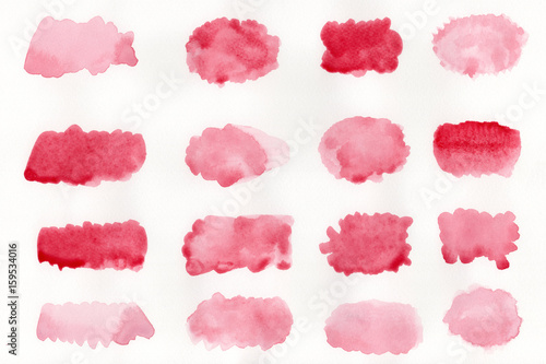 Abstract red watercolor on white background.The color splashing on the paper.It is a hand drawn.