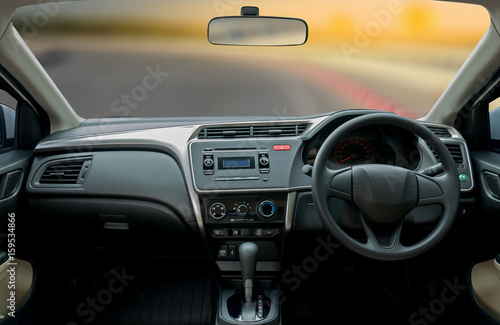 Travel in car. Element of design. the steering wheel inside of a car