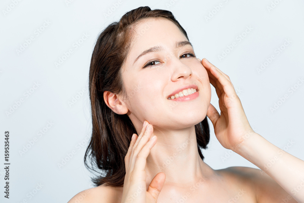 beauty girl of half caucasian and half asian. beauty and cosmetics concept. beauty girl of half caucasian and half asian. beauty and cosmetics concept.