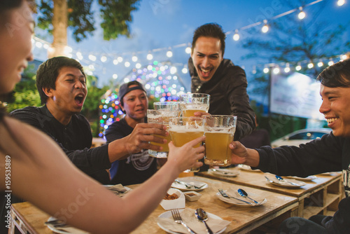 Group Of Friends celebrating the festival and Enjoying Evening Drinks,vintage style.