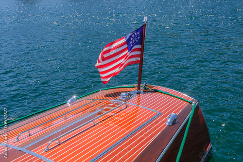 Mahogany Runabout with Stars and Stripes Ensign photo