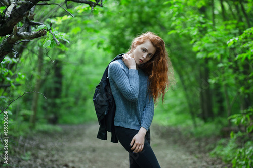 Young redhead girl outdoors