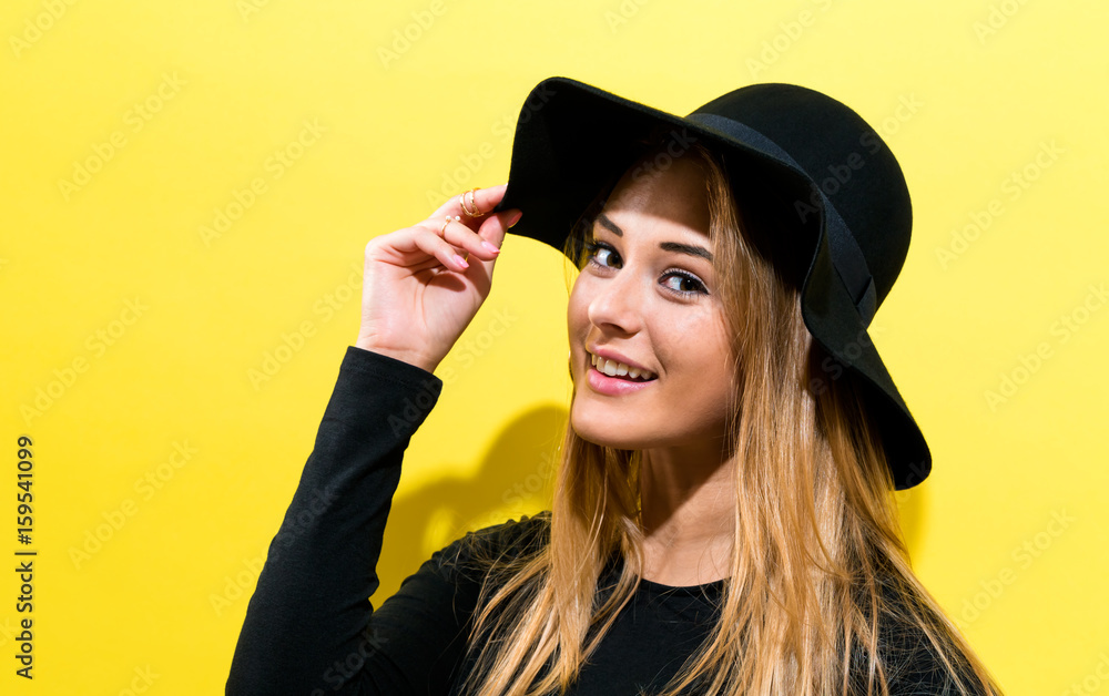 Happy young woman wearing a hat Happy young woman wearing a hat