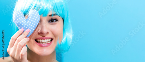 Beautiful woman in a bright blue wig