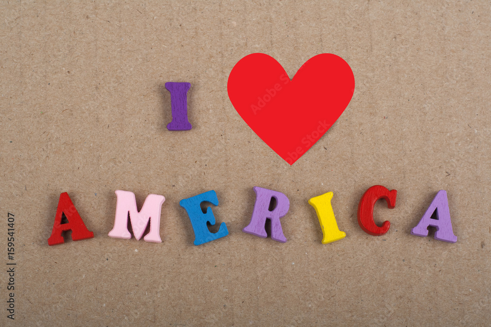 I love America word on paper background composed from colorful abc alphabet block wooden letters, copy space for ad text. Learning english concept. I love America word on paper background composed from colorful abc alphabet block wooden letters, copy space for ad text. Learning english concept.