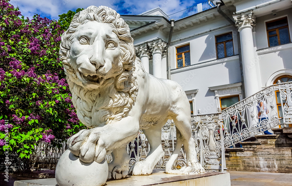 Marble sculpture of lion in the park of Yelagin island in St.Petersburg, Russia